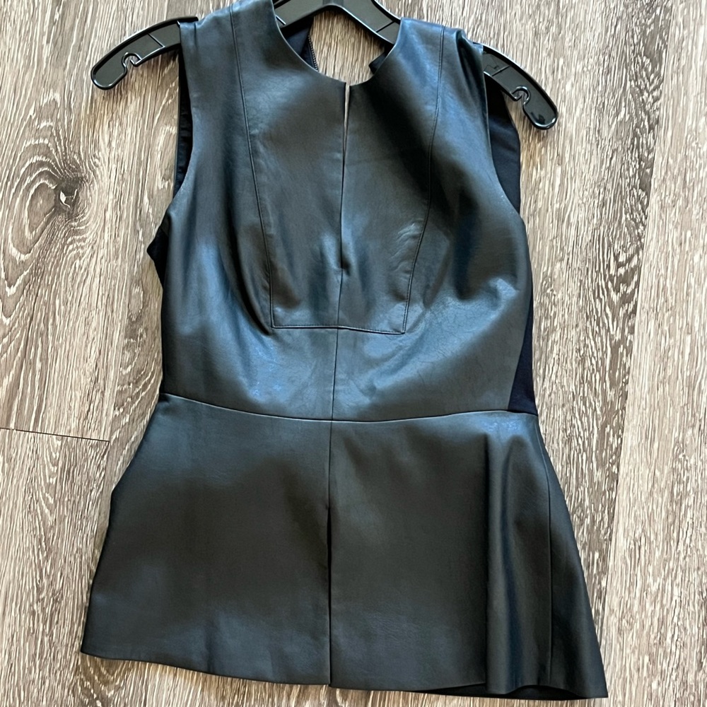 BCBG Black Faux Leather bodice peplum sleeveless top.
